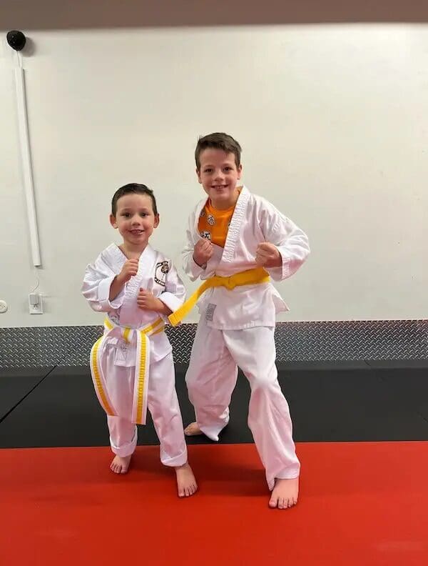 two kids having fun during self defense lessons