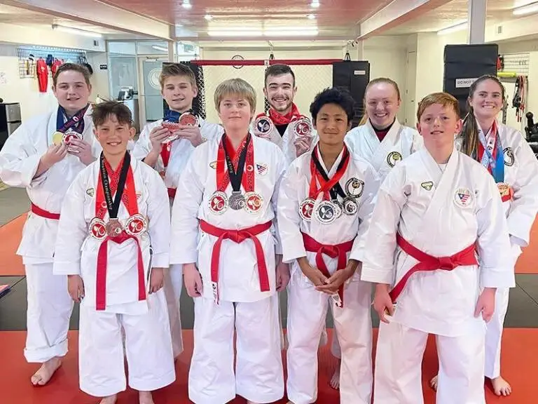 group of students showing confidence after martial arts classes