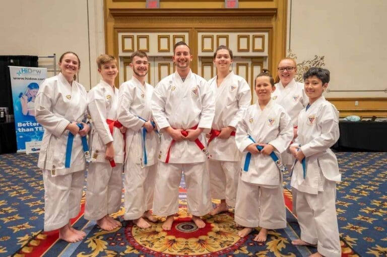 group of students showing confidence after martial arts class