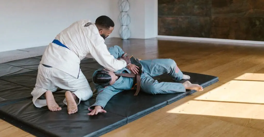 Self defense training for beginners learning grappling control techniques